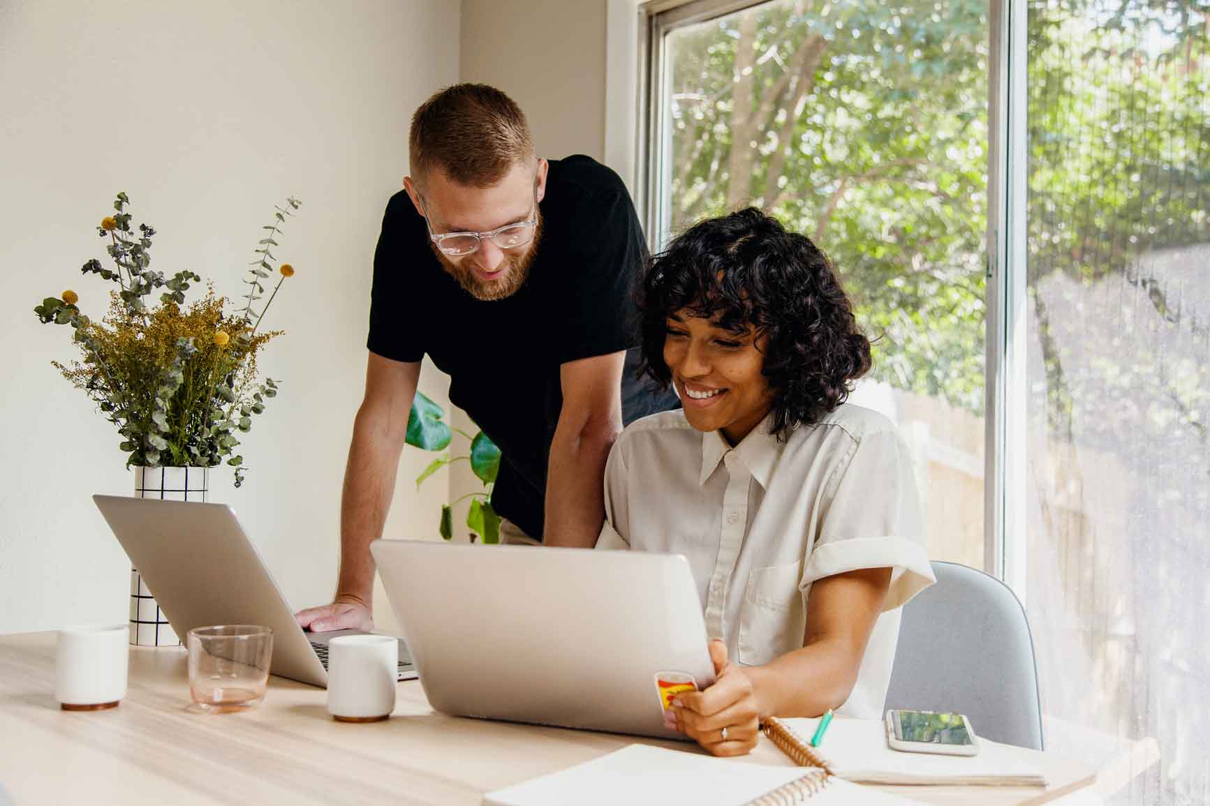 A young couple who works together at home