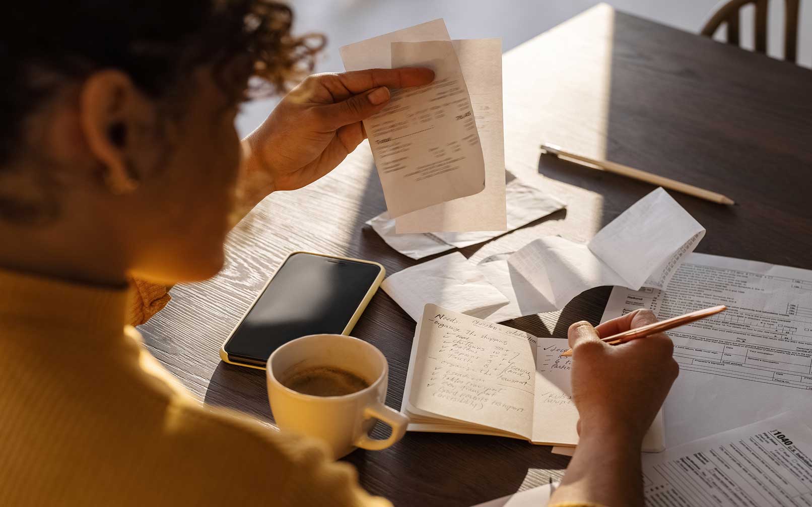 Woman doing taxes and budgeting